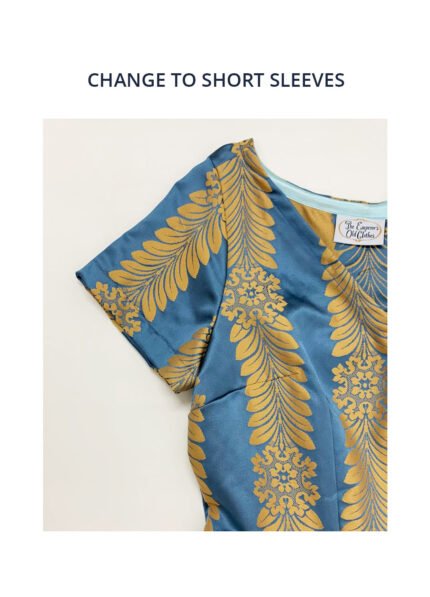 A close up image of one of our dress designs showing our sleeve options. The dress is blue and gold and has a V neckline.