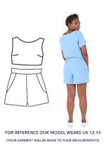 Our model An wears a blue checked high-waisted shorts two piece. They are stood facing the camera with their hands on their hips and their right foot pointing up.